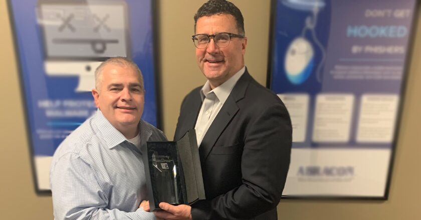 Mike White Gives Npi Sales Acceleration Award To Tangent Group